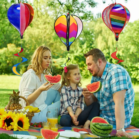 Family picnic under Three Pack Colorful Hot Air Balloon Wind Spinners For Outdoor Garden Yard Decor Large Hanging Wind Socks
