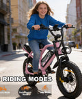 Teen riding 16-Inch Fat Tire Electric Mountain Bike With 800W Peak Motor, Removable Battery, Front Fork Suspension in Black Pink on street