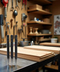 No Nonsense Center Punch Set With Rock Solid High Carbon Steel Build on workbench, showing three black handles for precise marking.