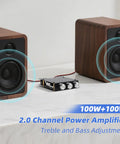 Beefy Bluetooth 5.0 HiFi Stereo Amplifier Board with 100W per channel, treble and bass control, shown between two speakers