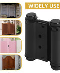 3 Inch Double Action Spring Hinges 4 Pack Matte Black Stainless Steel Self Closing Double Swing Hinges mounted on door panels.