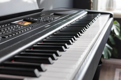 Close-up of DGX-670B 88 Key Weighted Digital Piano With CFX Grand Piano Sound And Acoustic Touch Action, Black Finish.