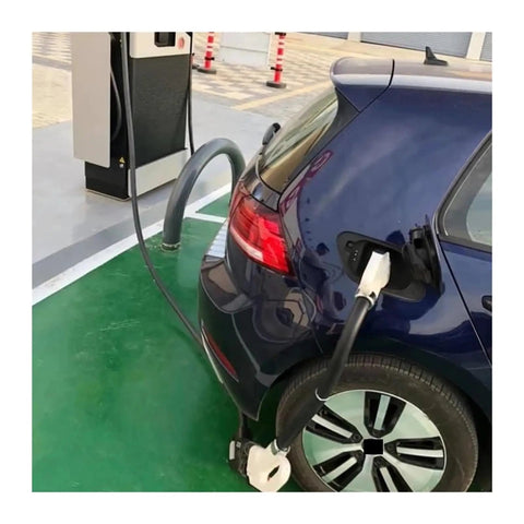 Heavy Duty Ccs2 To Ccs1 Ev Charging Adapter 200A Connector in use on a blue electric vehicle at a charging station.