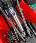 2 Pack Steel CVD Driveshafts For 1 To 18 TRX4 M K10 F150 RC Crawler Upgrades Silver Beefy Heavy Duty Connection For Smooth Power Transfer And Precision Fit Ideal RC Crawler Upgrade For Stability And Durability. Installed steel RC crawler driveshafts under red chassis.