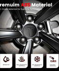 Close-up of 4 Pack Car Wheel Center Hub Cap Kit With 22 Lug Nut Covers 2.2 Inch 56mm Rim Caps for Tesla with matte black finish