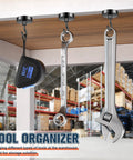 Heavy Duty Magnetic Hooks 80 Lb Capacity With Neodymium Grade 5 Magnets holding tools under a shelf in a workshop setting