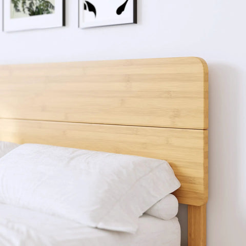 Close-up of the Natural Bamboo King Size Platform Bed Frame With Headboard showcasing a smooth bamboo headboard.