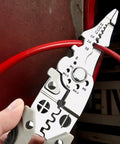 Pro Grade Heavy Duty Wire Stripper And Cutter Pliers For Electricians gripping a red wire, showcasing stripping and cutting features.