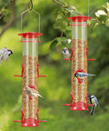 2 Pack Outdoor Bird Feeders With 6 Feeding Ports in clear tubes hanging with birds on each port in a garden setting.