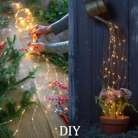 Solar Powered Fairy Lights Outdoor Waterproof 200 LEDs Copper Wire String Lights With 8 Modes Waterfall Style Firefly Vine Lights For Garden Trees Christmas Decor Dope Mom Gift being crafted into DIY floral and garden decorations.