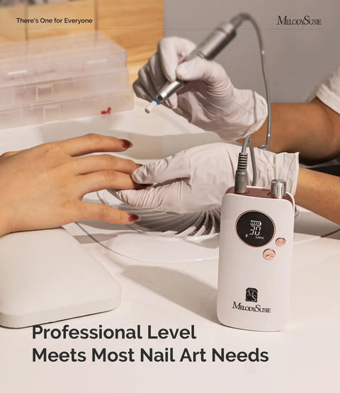 Clip On Rechargeable Nail Drill SC320F 30000RPM E File in use for manicure shaping and gel removal with a pastel colorful design.