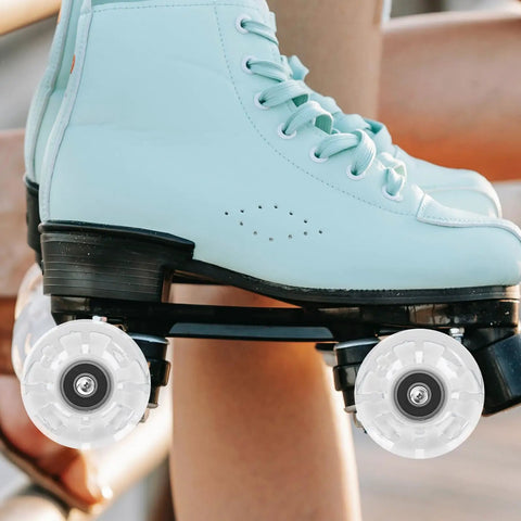 Turquoise quad skates with 4 Piece Luminous PU Roller Skate Wheels Set With LED Light For Outdoor Quad Skates visible.
