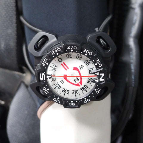 Bungee Mount Scuba Dive Compass With Glow In The Dark Face for Night Dives and Low Vis Conditions, attached to diving gear