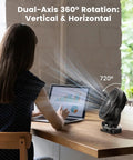 Clip On Fan 40000mAh Portable Rechargeable 8 Inch Battery Operated Fan With LED Light Remote Timers Up to 127 Hours Battery Life and Hook for Office Desk Camping Treadmill Tent Golf Cart on desk next to woman with laptop under text "Dual-Axis 360° Rotation: Vertical & Horizontal".