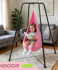 Child reading on Sensory Swing Stand Frame With Pod Chair And Swings Set For Kids And Adults Heavy Duty Metal Swing