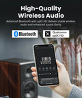 Person holding smartphone displaying Hi Res 2.0 Powered Bookshelf Speakers With Planar Magnetic Tweeters, 256W RMS, AptX HD Bluetooth controls