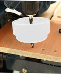 3 Pack Hole Saw Dust Collector Shields Clear Bubble Dome for Ceiling Drilling capturing debris while drilling into wood.