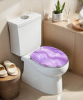 Elongated Abstract purple liquid marble watercolor glitter Toilet Seat on a modern toilet, showcasing its elegant design in a bathroom setting.