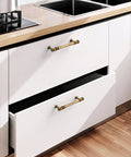 Close-up of kitchen drawers with 10 Pack 3 Inch Antique Brass Cabinet Pulls, Vintage Zinc Alloy Handles For Kitchen Drawers.