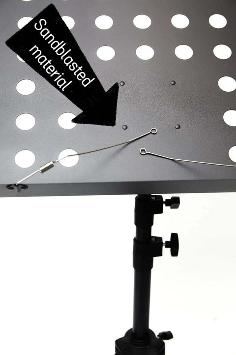 Close-up of folding music stand with sandblasted desk material, part of the Folding Music Stand Portable With One Step Setup And Tool Free Height Adjustment