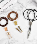 DIY Bolo Tie Making Kit With 3 Braided Leather Cords, 6 Alloy Cord Ends, 3 Iron Bolo Tie Slides, And 3 Classic Color Cords In Black, Gold, And Antique Copper For Crafting Custom Fits From Formal To Casual. Black, gold and copper cords with metal ends