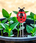 3 In 1 Ladybug Soil Tester Kit for Garden and Lawn in pot with green plants, measures pH moisture nutrients, red plastic alloy.