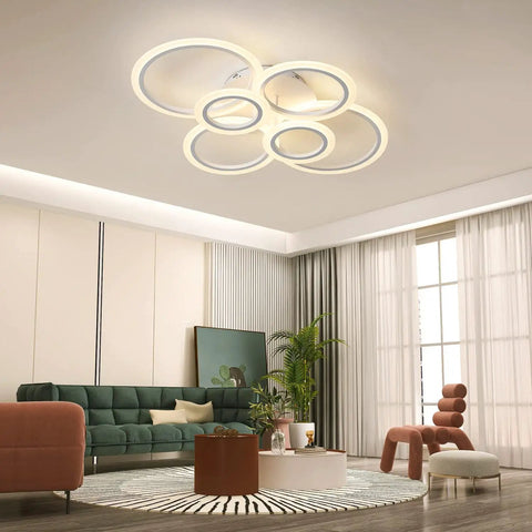 Modern living room with 30.5 Inch Acrylic LED Ring Ceiling Light Fixture Dimmable Flush Mount Chandelier above seating area.