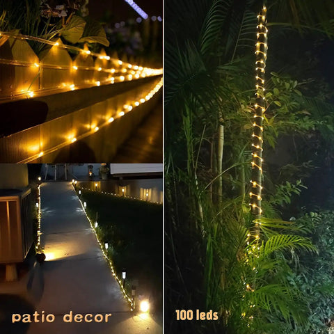 Solar Rope Light IP65 Waterproof 39Ft 100LEDs Outdoor String Lights illuminating garden path and wrapped around a tree.