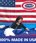 Worker sewing Premium 5x8 American Flag Built Tough For All Weather Outdoors Heavy Duty PolyMax Polyester With Sewn Stripes And Embroidered Stars Made In USA.