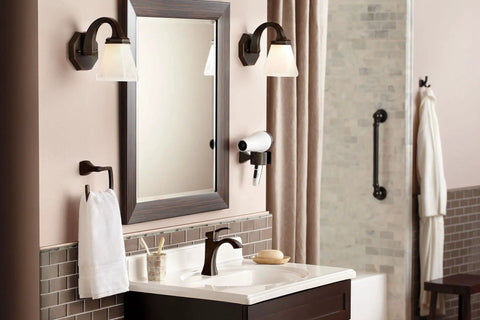 Voss Oil Rubbed Bronze Bathroom Hand Towel Ring From The Voss Collection with coordinating faucets on a modern bathroom wall.