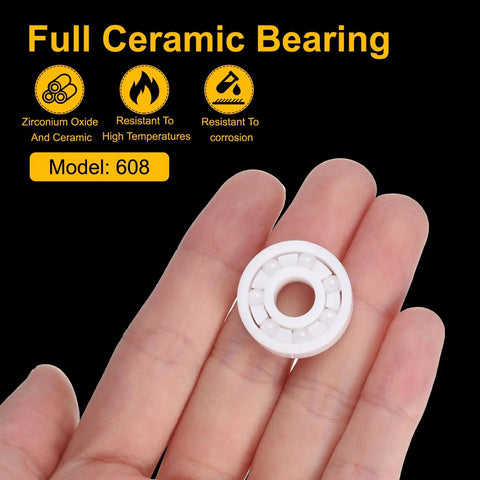Rock Solid Full Ceramic Bearings 2 Pack 608 Zirconia Ball Bearings 8X22X7mm held in hand for custom rig setups.