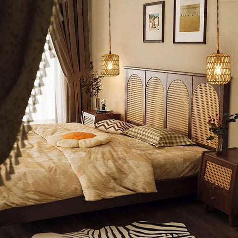 Handcrafted Boho Rattan Plug In Pendant Light With Six Watt Led Bulb And Warm 3000k Glow Featuring A Handy Dimmer Switch Plus Fifteen Foot Cord Easy Peasy Setup And Total Vibe Upgrade For Bedroom illuminating a cozy bedroom with decorative headboard.