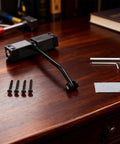 Automatic Hydraulic Door Closer With Stainless Steel Spring Hinge hardware set on wooden table