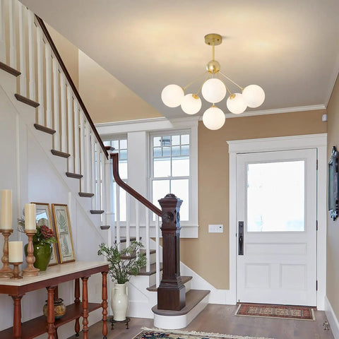 Six Light Frosted White Glass Globe Sputnik Chandelier in Modern Gold Finish for a Lit Statement Flush Mount Ceiling Light in Foyer