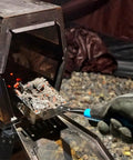 Ash Shovel For Fire Pit And Fireplace Charcoal Scoop Stainless Steel 14.6 Inch Handle in use scooping ashes from stove.
