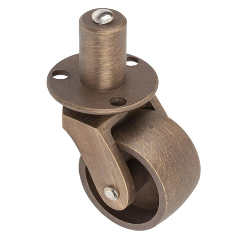 Old School Antique Brass Stem Casters With Round Plate Slick Rolling Furniture Wheels For Tables Chairs Dressers And Cabinets close-up view of single brass caster wheel