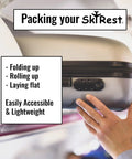 Person packing a suitcase with instructions for folding, rolling, laying flat; labeled 'Packing your SkiRest'