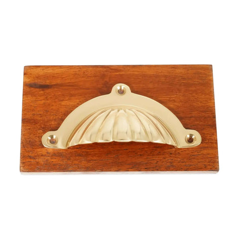Polished Brass Cup Pull Cabinet Handle For Drawers And Doors, Cup Shell Design, mounted on wood, ergonomic handle with matching screws