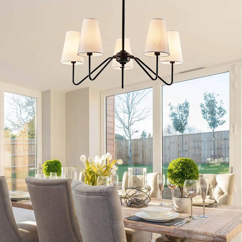 Totally Chic Modern Farmhouse Small Chandelier In Black Finish in dining room over table, perfect light fixture for easy install ceiling mount.
