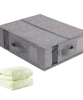 Heavy Duty Linen Bed Sheet Storage Organizer For Closet With Folded Blanket Pockets And Oversized Comforter Rack on gray fabric box with green blanket