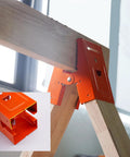 Close-up of Heavy Duty Cut Off Saw Horse Brackets 2 Pack Cold Rolled Steel mounted on wooden sawhorse for steady cutting.