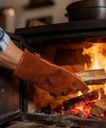 14 Inch 932F Heat Resistant Cowhide Leather Welding Gloves For Grill Pros And Home Cooks With Reinforced Palm in use with fireplace