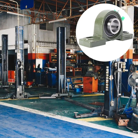 Heavy Hitter Cast Iron Pillow Block Bearing Kit Featuring Dual Bolt Flange Housing And Compact Two Hole Design For Cramped Workspaces And Daily Factory Production Lines displayed in a warehouse with equipment.