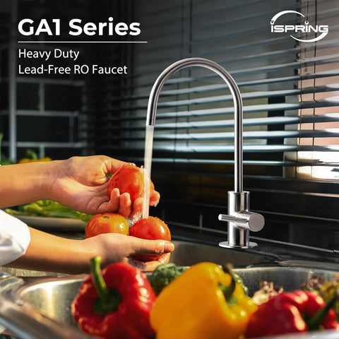 Premium Heavy Duty Reverse Osmosis Faucet For Kitchen Sink, brushed nickel finish, dispensing water while washing vegetables.