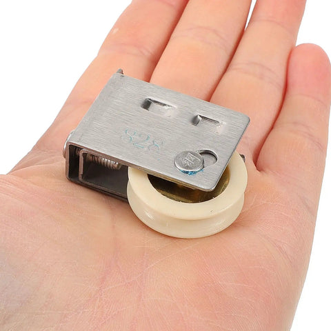 Heavy Duty Guide Pulley Roller Replacement Wheel For Sliding Barn Doors And Cabinets Featuring Rock Solid Construction And Smooth As Butter Silent Glide Action in hand.