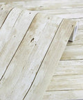Roll of vintage wood shiplap peel and stick wallpaper with realistic grain texture for easy application and removal.
