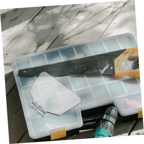 Dustproof 6-Inch Bench Grinder Eye Shield Guard Kit next to a hand saw on a toolbox lid outdoors.