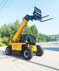 Heavy Duty 4WD Telehandler Forklift With Flexible Reach Boom For Smooth Material Moving And Toughest Job Sites Built Contractor Grade, shown in action with extended boom.