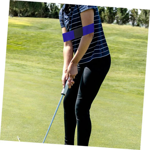 Golfer using Game Changing Adjustable Golf Swing Correction Belt For Golfers Elbow Brace And Wrist Trainer, focusing on stance.