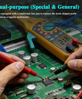 Automotive Circuit Tester with Hook Probe in use on circuit board, displaying voltage on screen, showcasing dual-purpose feature.